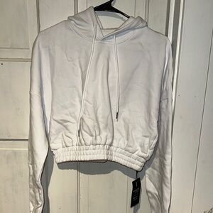 NVGTN white cozy vibes drop shoulder cropped hoodie. NWT size medium